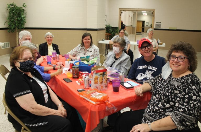 Ursuline Associate Martha Alle, right, and her husband, Detlef, joined several Ursuline Sisters on the “Bad Habits” team. Their team got the most points in the first round of trivia.