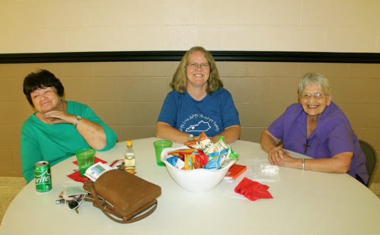 Sister Mary Celine Weidenbenner, right, was part of the “Decades of Fun” team, along with Mary Haycraft, left, and Pat Basinger.