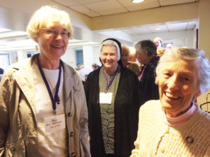 Mary Ford Vuncannon A55, left, Sister Rose Marita O’Bryan A60 and Sister Marietta Wethington A55, prepare for lunch following Mass.