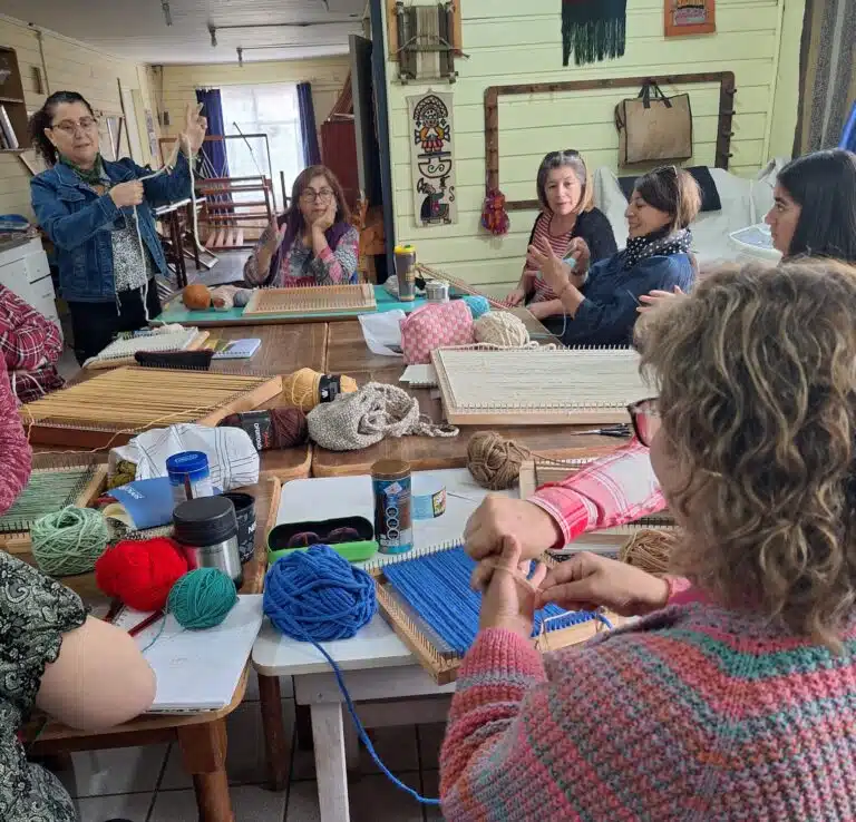 An instructor leads a weaving class at Casa Ursulina. An instructor leads a weaving class at Casa Ursulina.