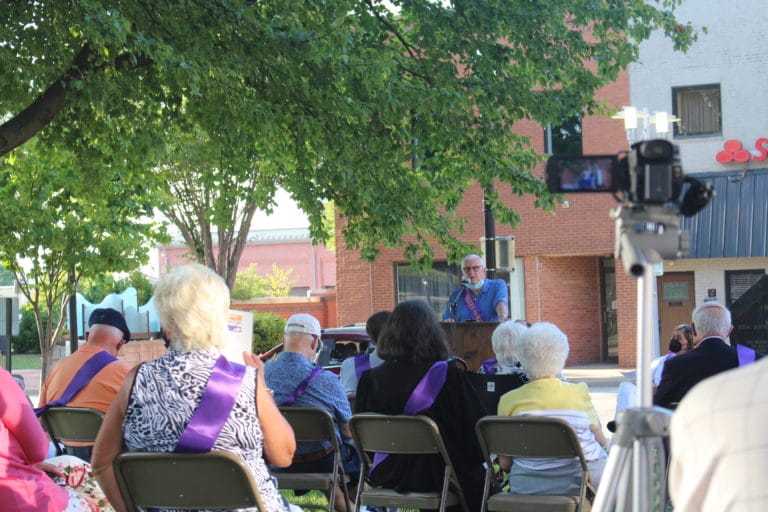 Daviess County Judge-Executive Al Mattingly speaks on the Courthouse lawn. He thanked many “women of note,” including Ursuline Sister Ruth Gehres. He said she motivated him to stay in college and finish his degree while she was the president of Brescia University.