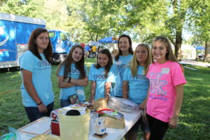 The Young Daughters of Saint Angela (Y-DOSA) group helped in the Yard Sale booth.
