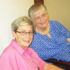 Sr. Judy and Helen: Sister Judith Nell Riney, left, and Sister Helen Smith share a smile on the final day of Community Days.