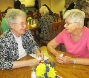 Sister Michele Morek, left, chats with Sister Jane Falke.